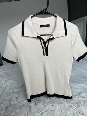 Cream Ribbed Polo Top with Black Trim